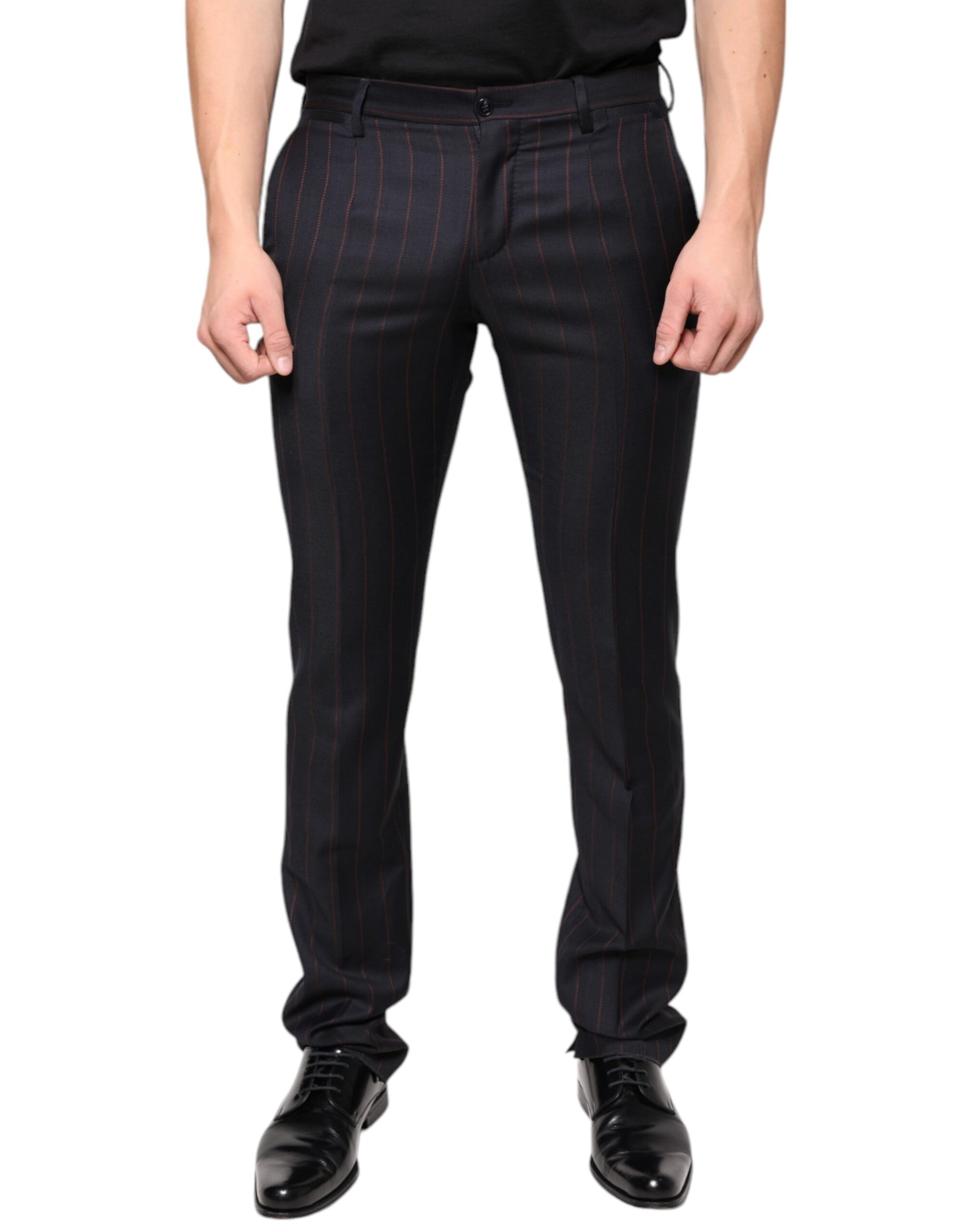 A pair of black dress pants with thin vertical stripes, designed by Dolce & Gabbana. They are intended for me