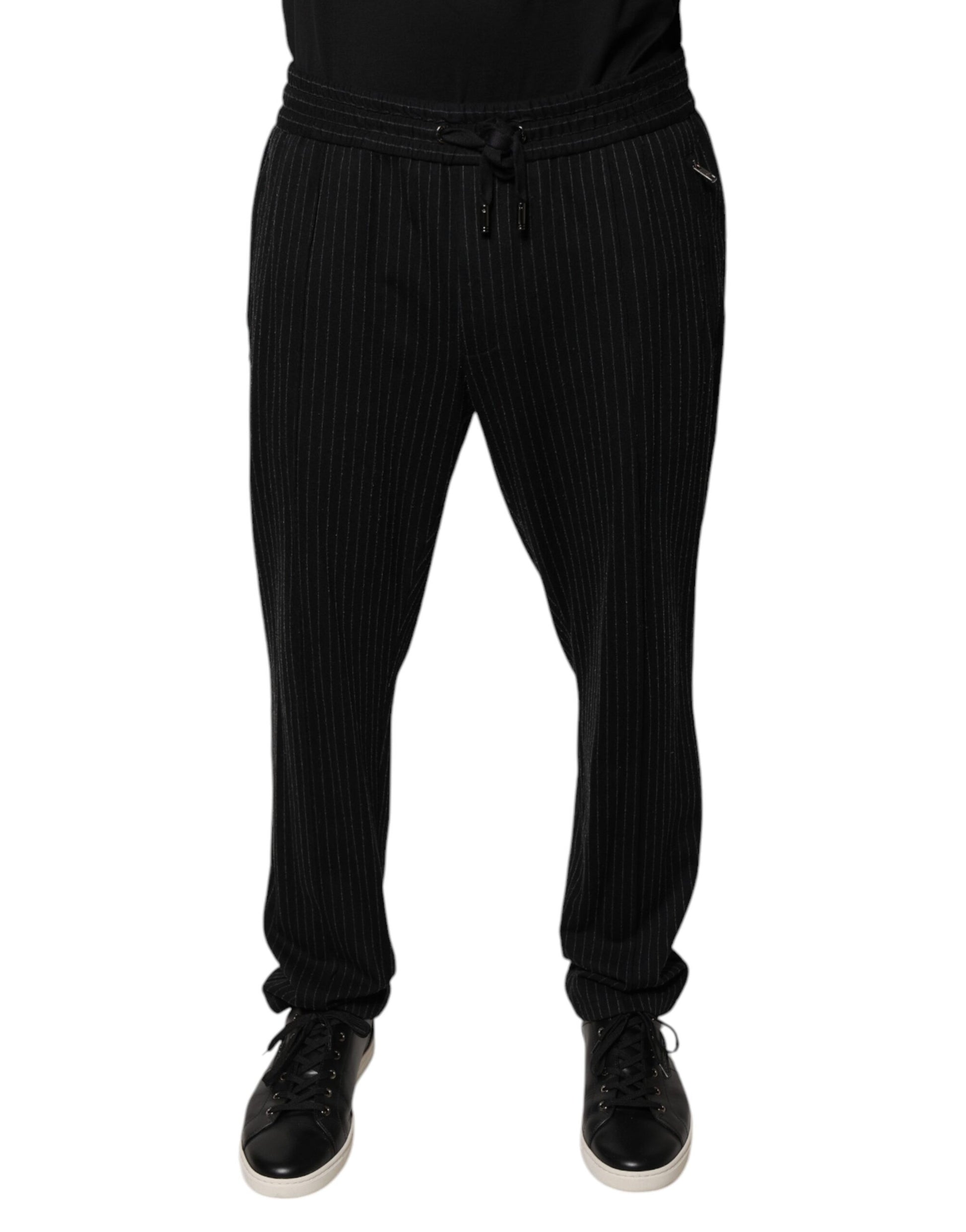 A pair of black striped viscose skinny dress pants