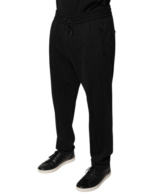 A pair of black striped viscose skinny dress pants