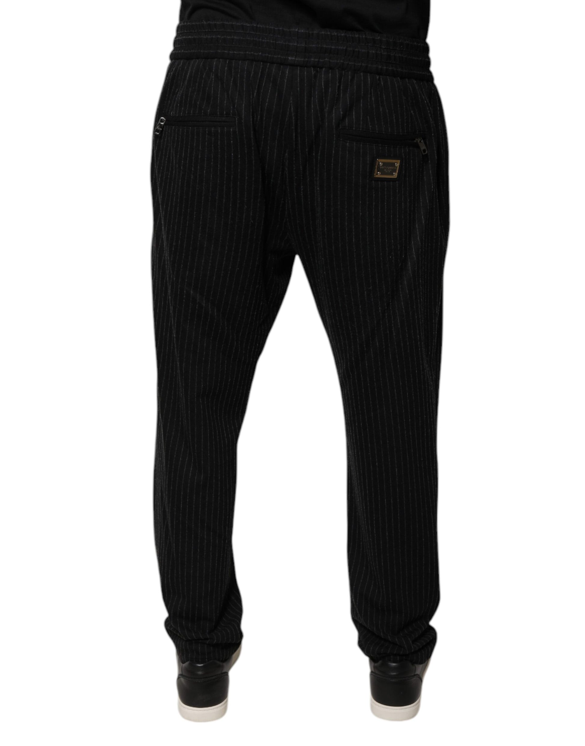 A pair of black striped viscose skinny dress pants from Dolce & Gabbana