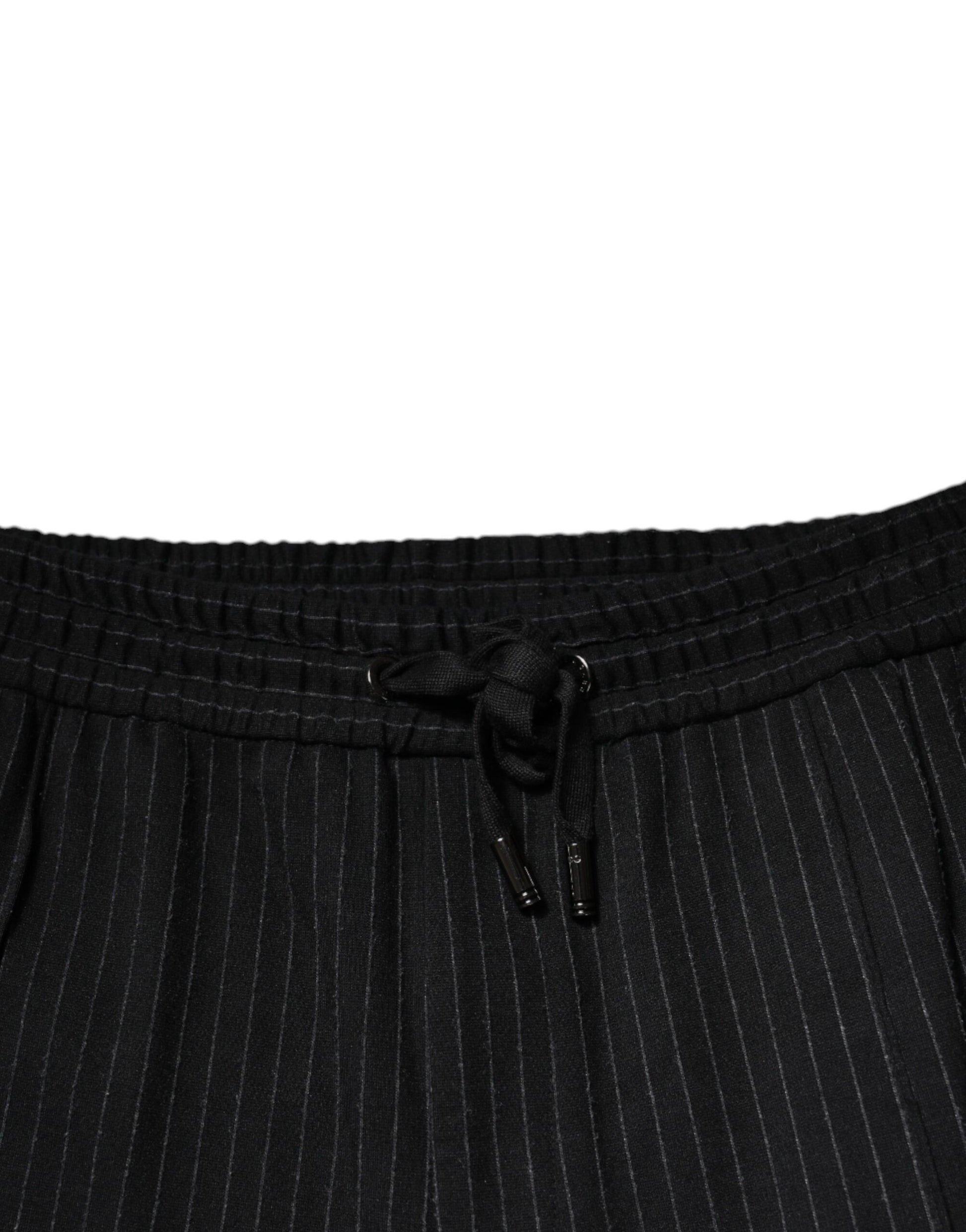 A pair of black striped viscose skinny dress pants