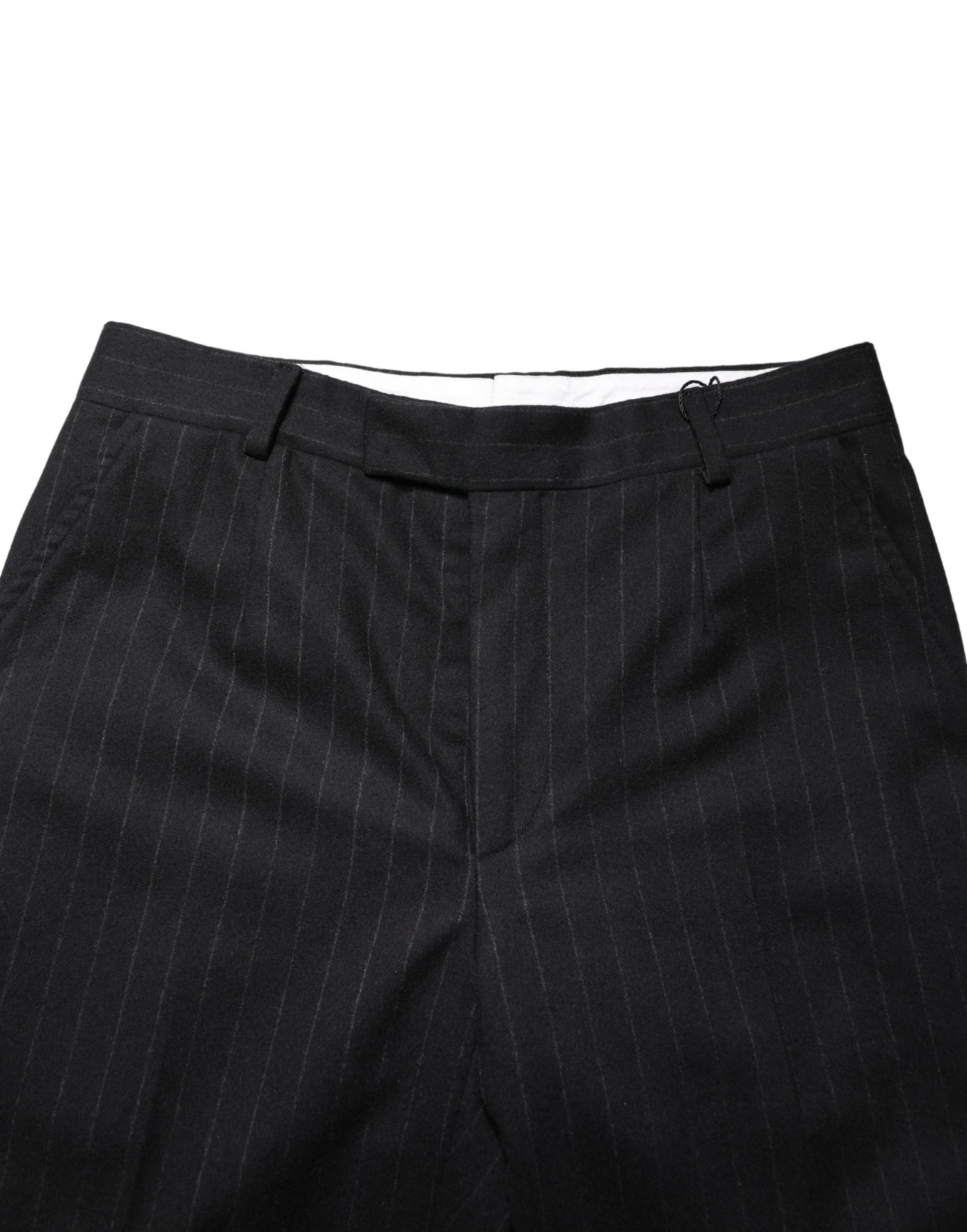A pair of black wool dress pants with a striped pattern, featuring a slim fit and a tailored design