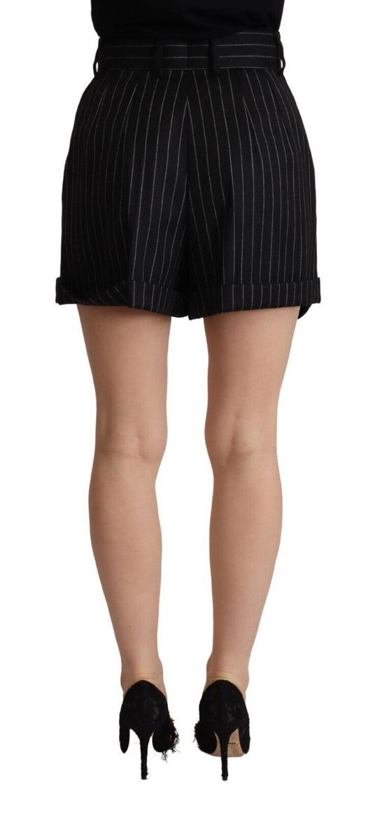 Black pencil skirt with white stripes, worn by a person standing against a grey background