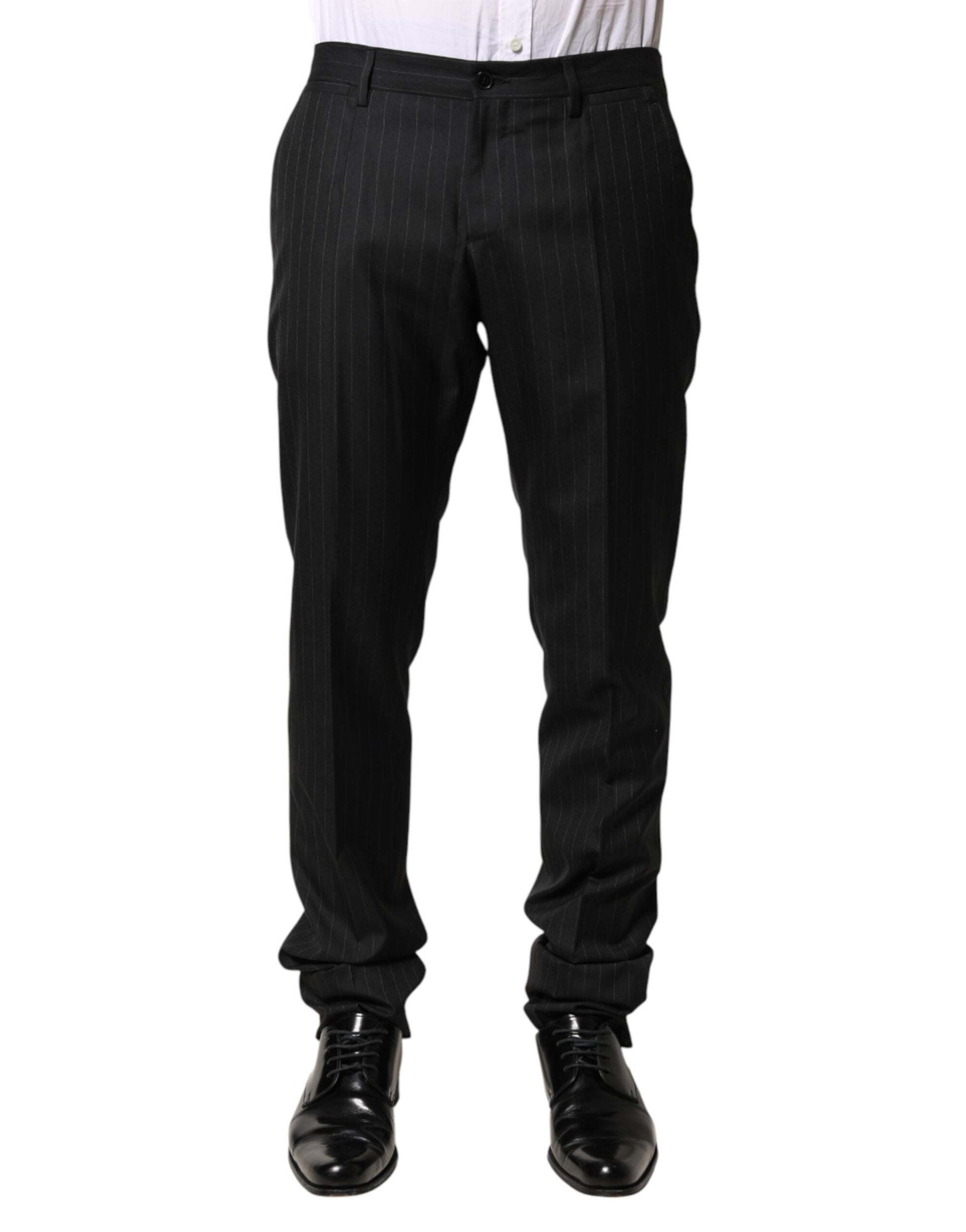 A pair of black wool trousers with a striped pattern, designed by Dolce & Gabbana