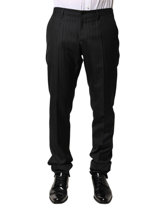 A pair of black wool trousers with a striped pattern, designed by Dolce & Gabbana