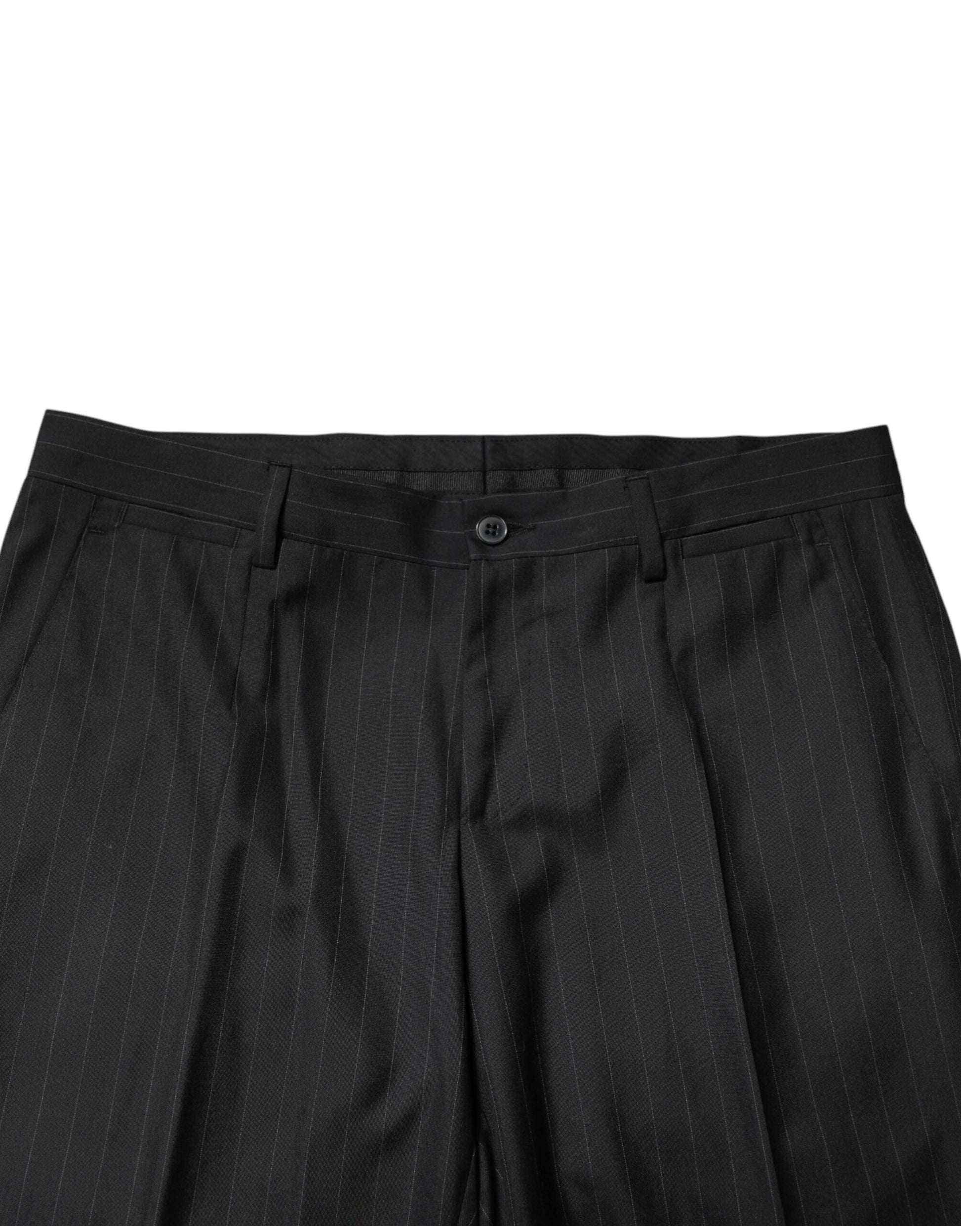 A pair of black wool trousers with a striped pattern, designed by Dolce & Gabbana