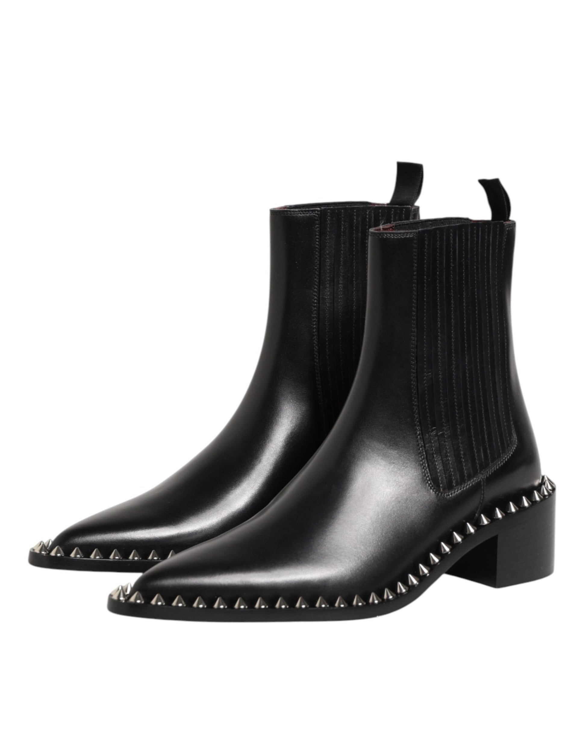 Pair of black leather boots with studded detailing on soles