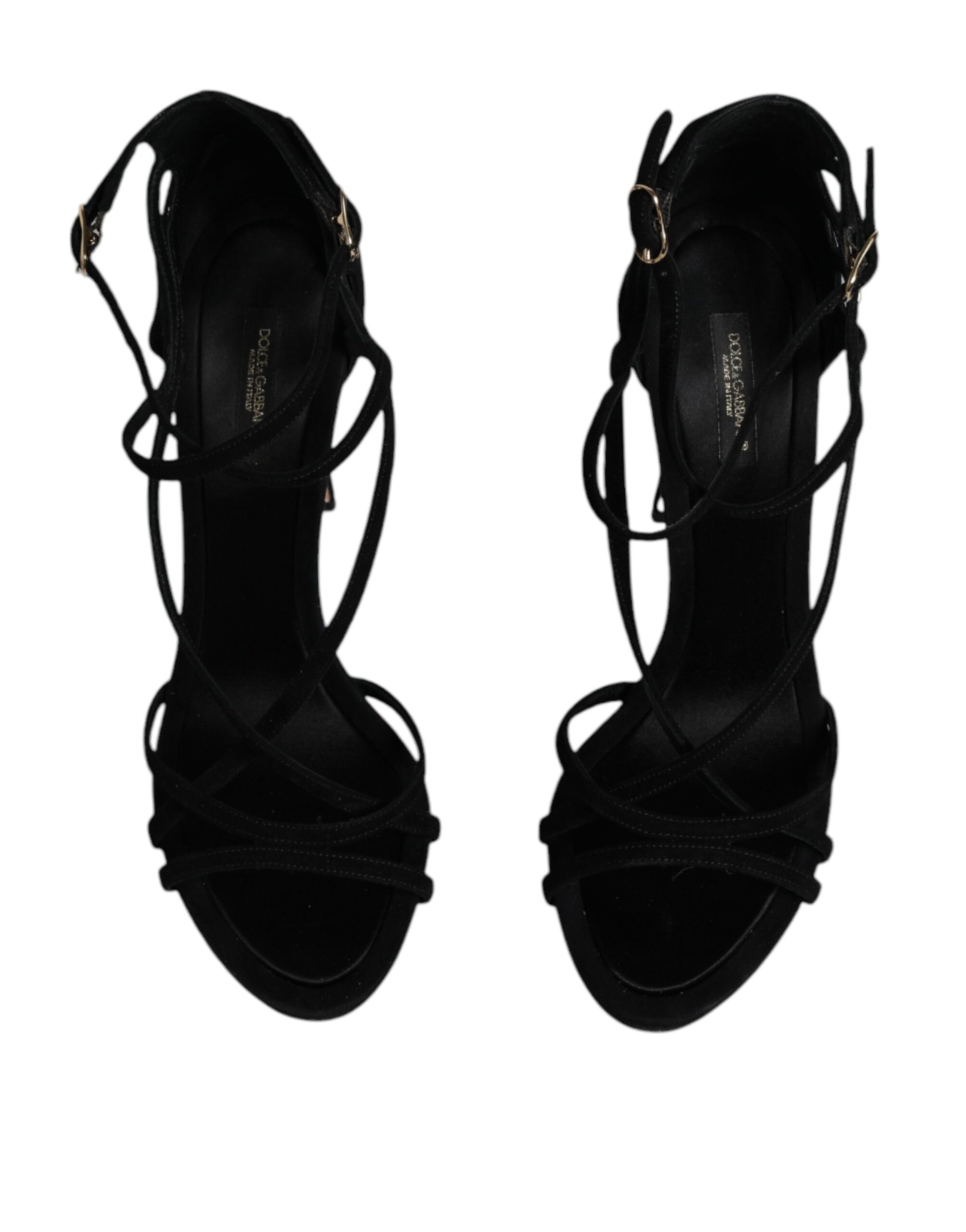 Pair of black high heel shoes with straps