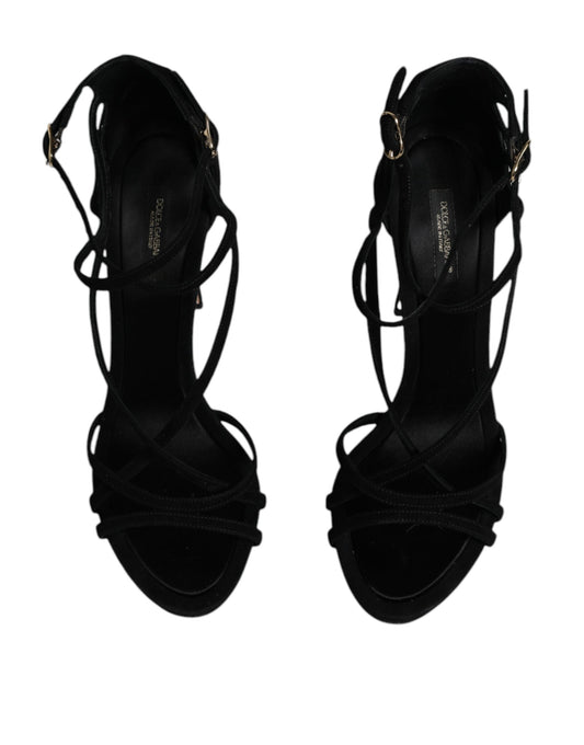 Pair of black high heel shoes with straps