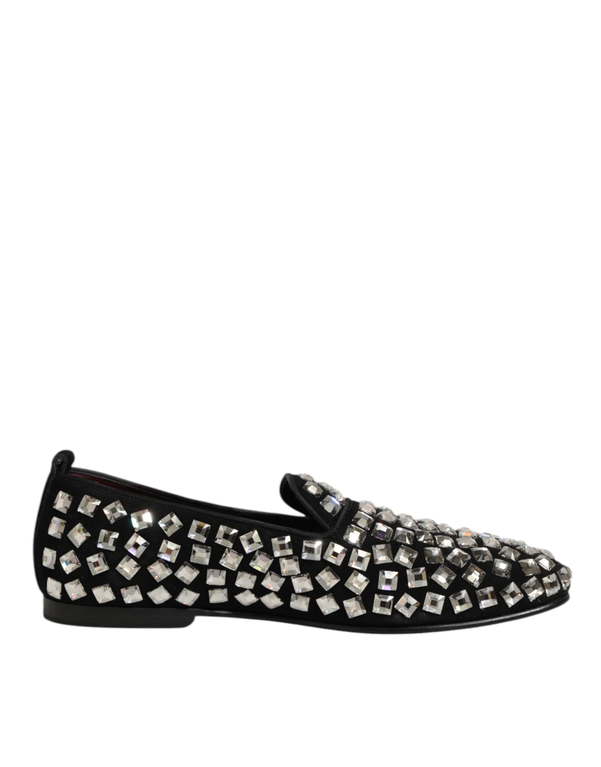 A pair of black suede loafers with crystal embellishments, designed by Dolce & Gabbana
