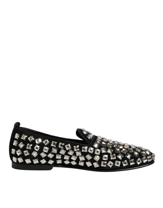 A pair of black suede loafers with crystal embellishments, designed by Dolce & Gabbana