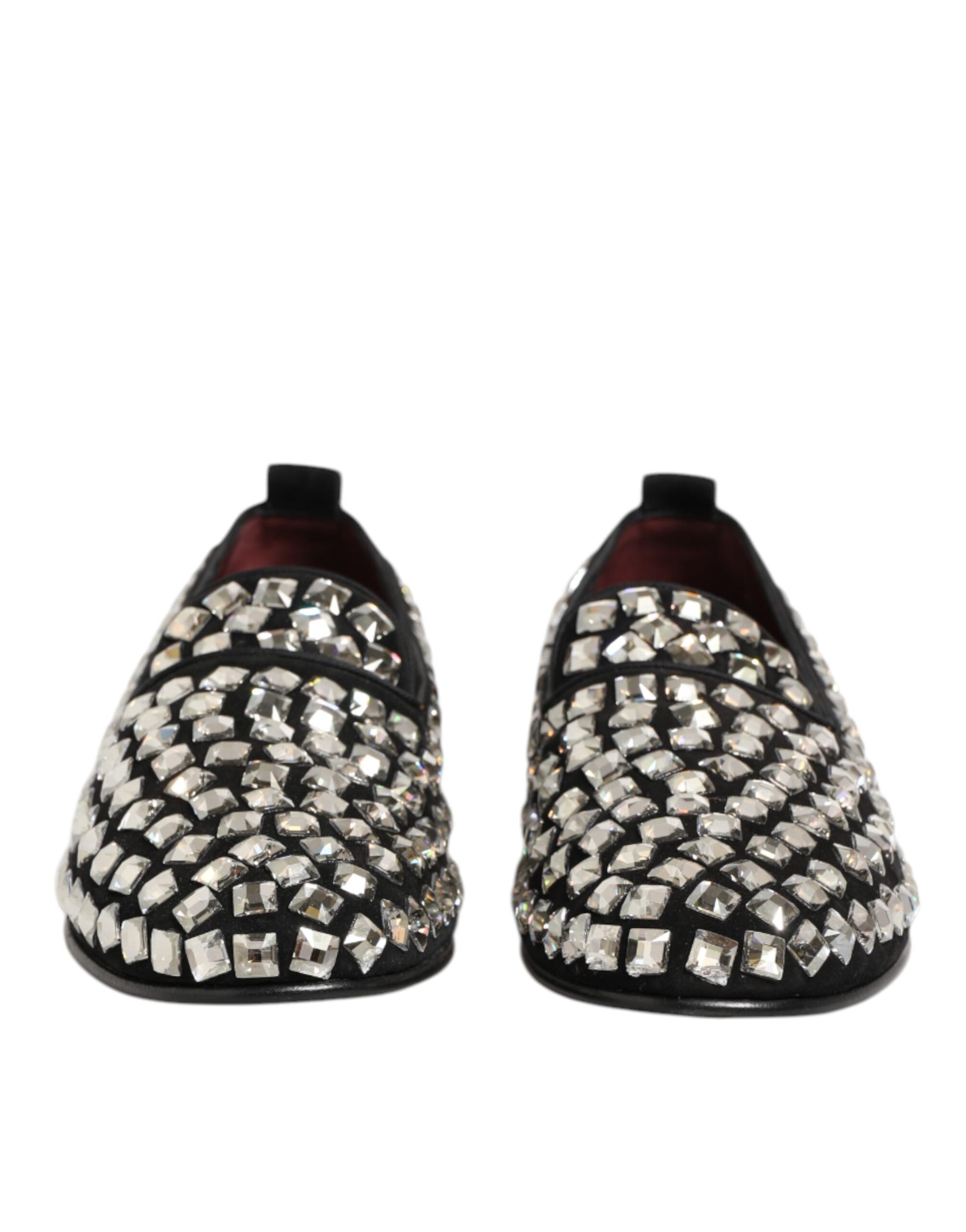 A pair of black suede loafers with crystal embellishments, designed by Dolce & Gabbana for men's dress shoes
