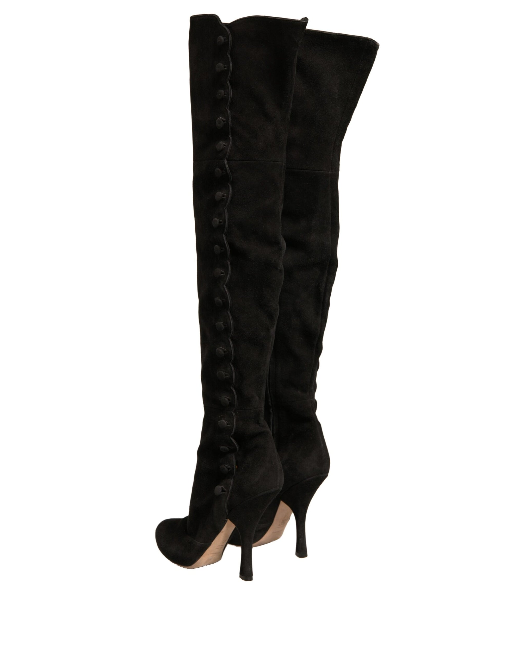 Black knee high boots with stiletto heels