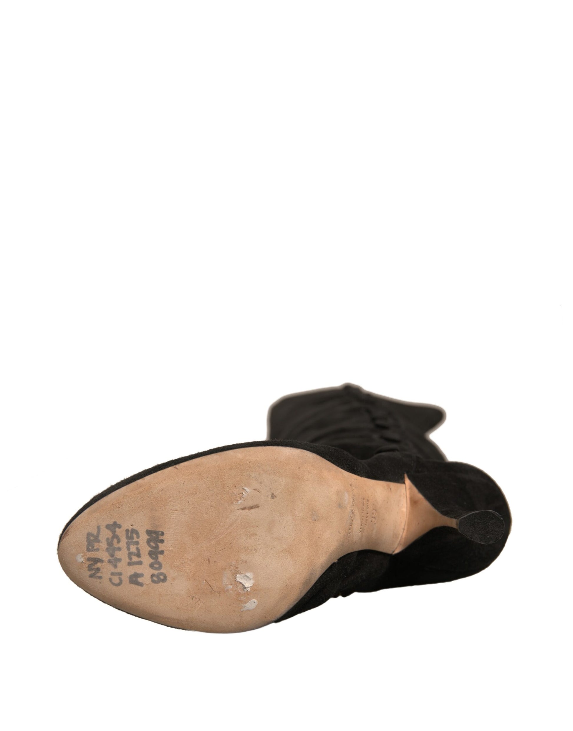 Brown shoe sole with writing on it