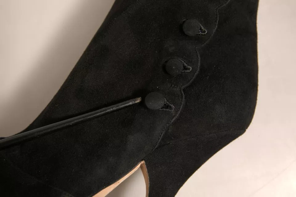 Black leather boot with buttons on side