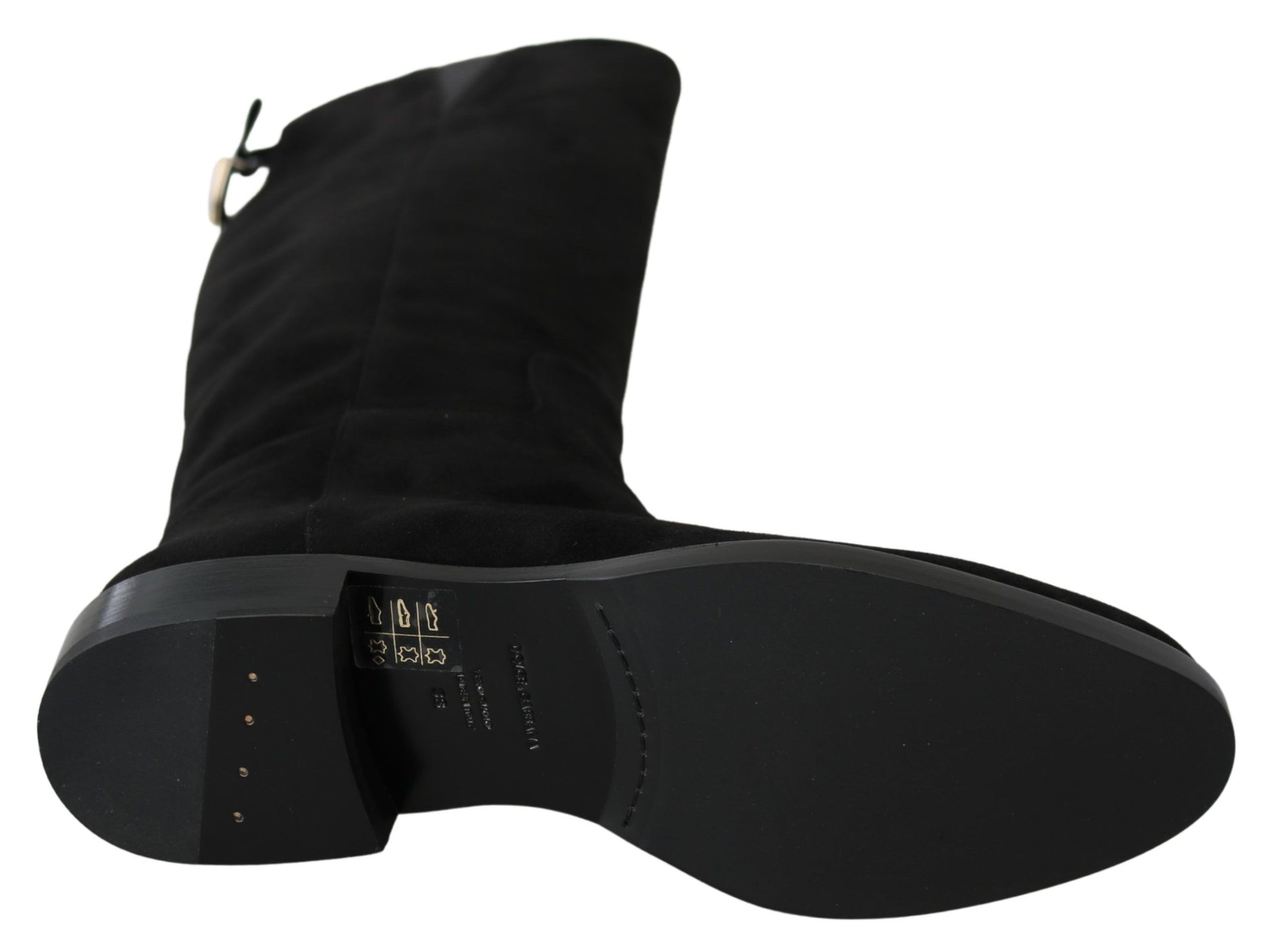 Pair of black leather boots with zipper closure and visible stitching details
