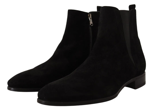 Pair of black suede boots with zipper detailing and elastic panels for ease of wear