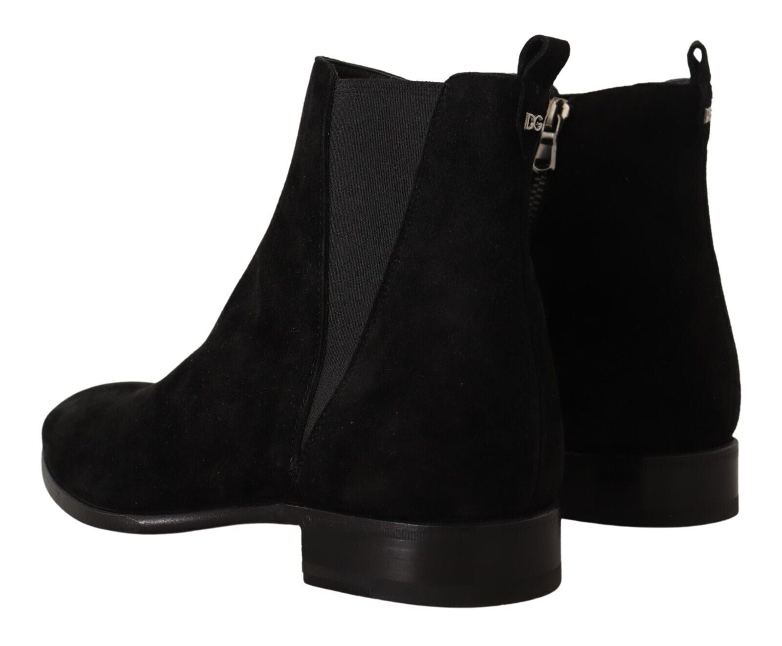 Pair of black suede boots with zipper detailing and chunky heels