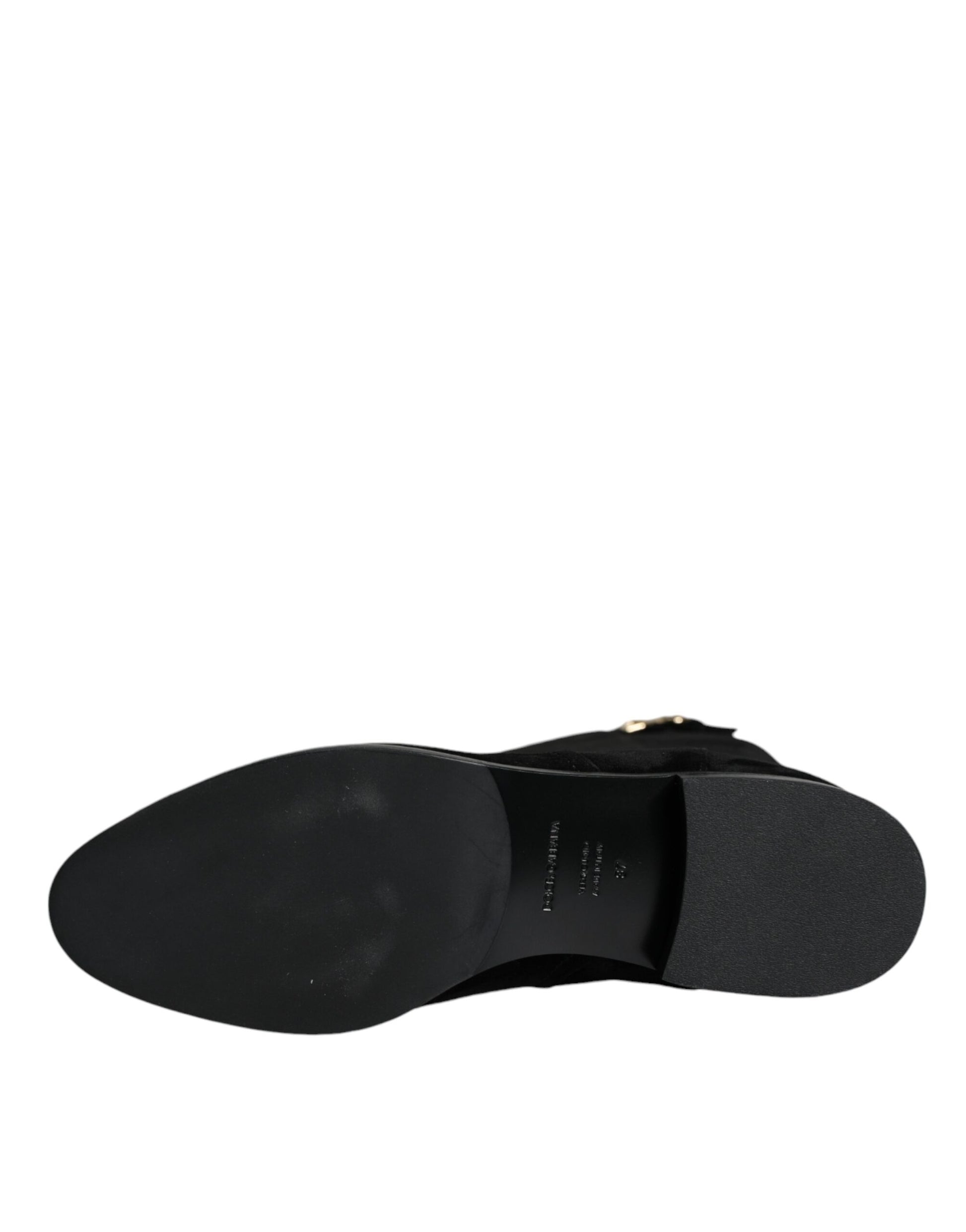 Black dress shoe on display