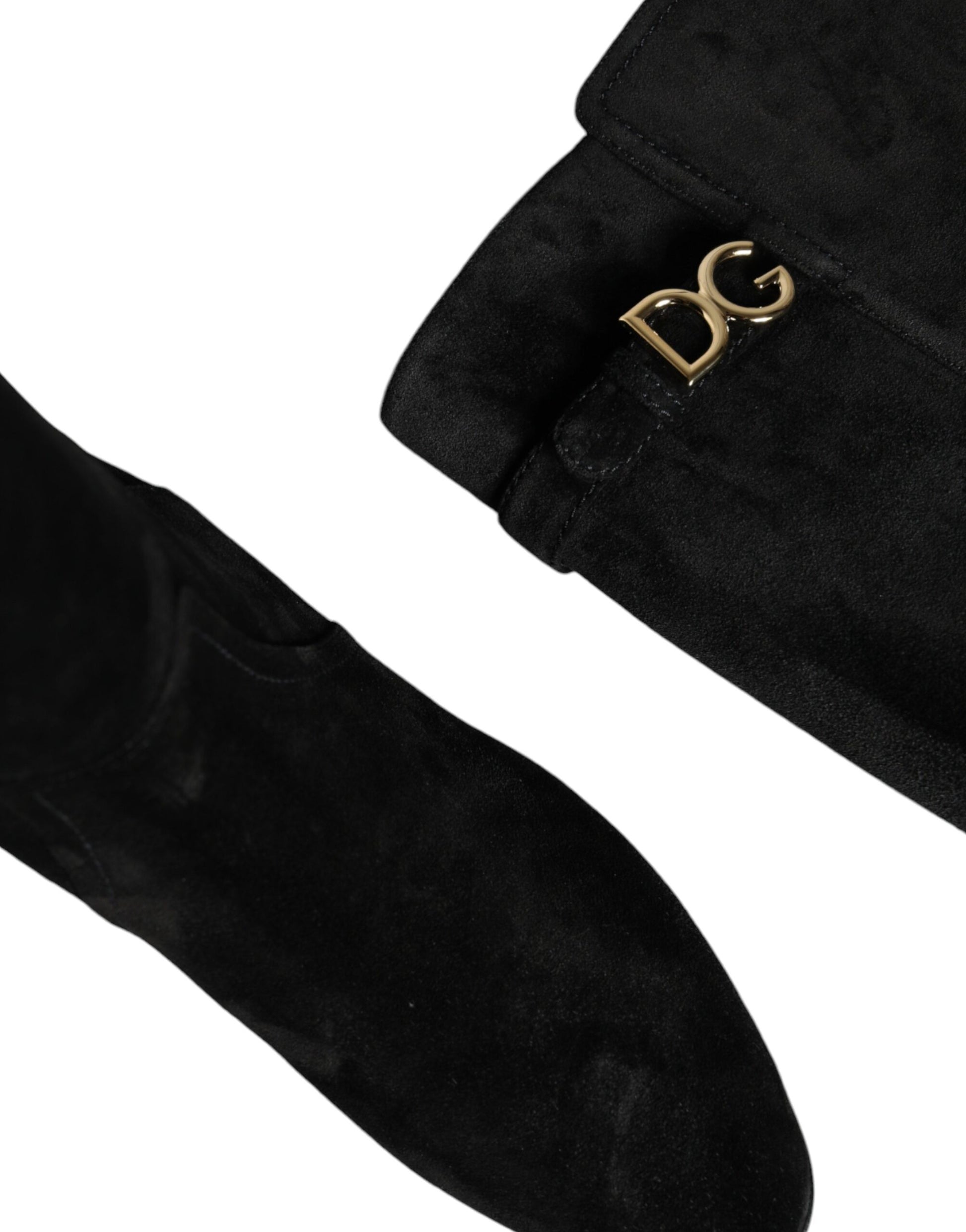 Black suede boots with gold Gucci logo on side