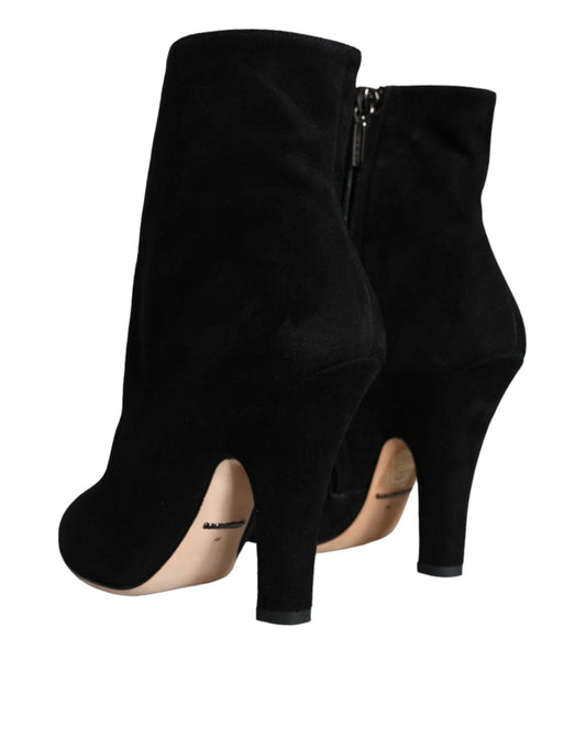 Pair of black knee high boots