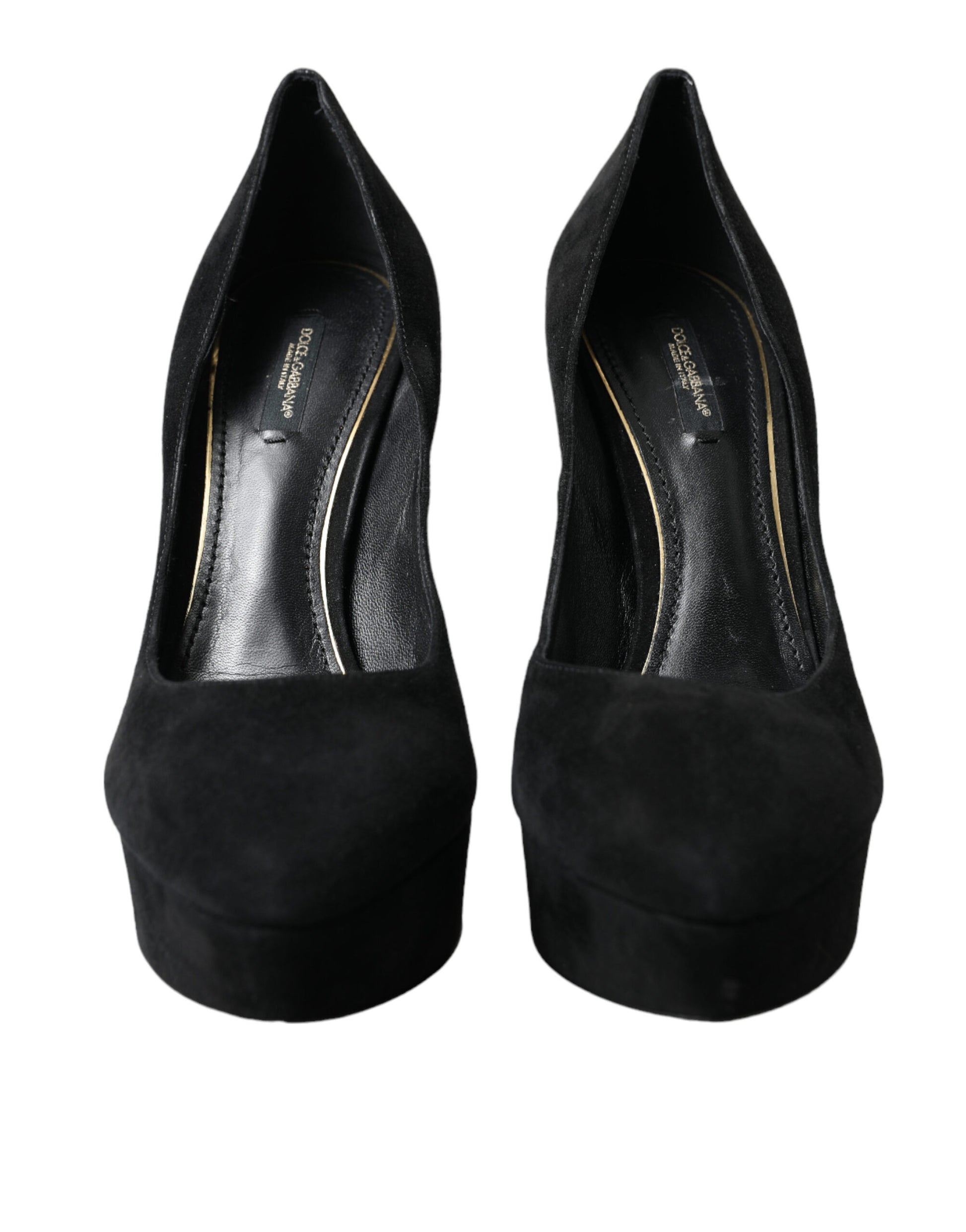 Pair of black high heel shoes with gold accents