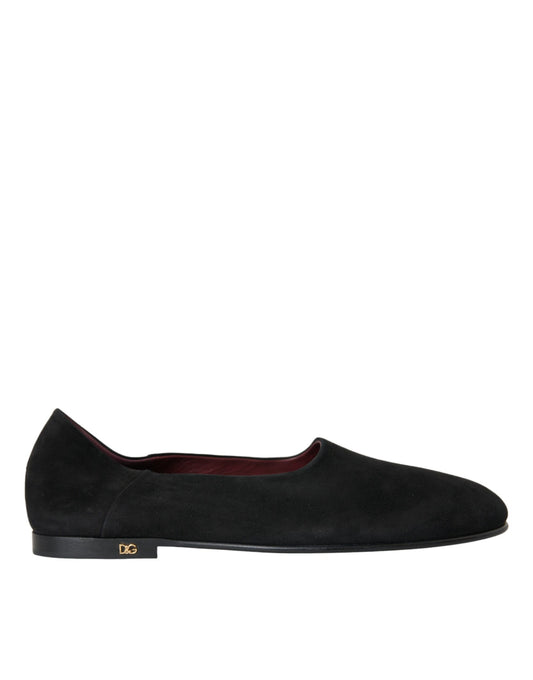 Black loafer shoe with a red sole