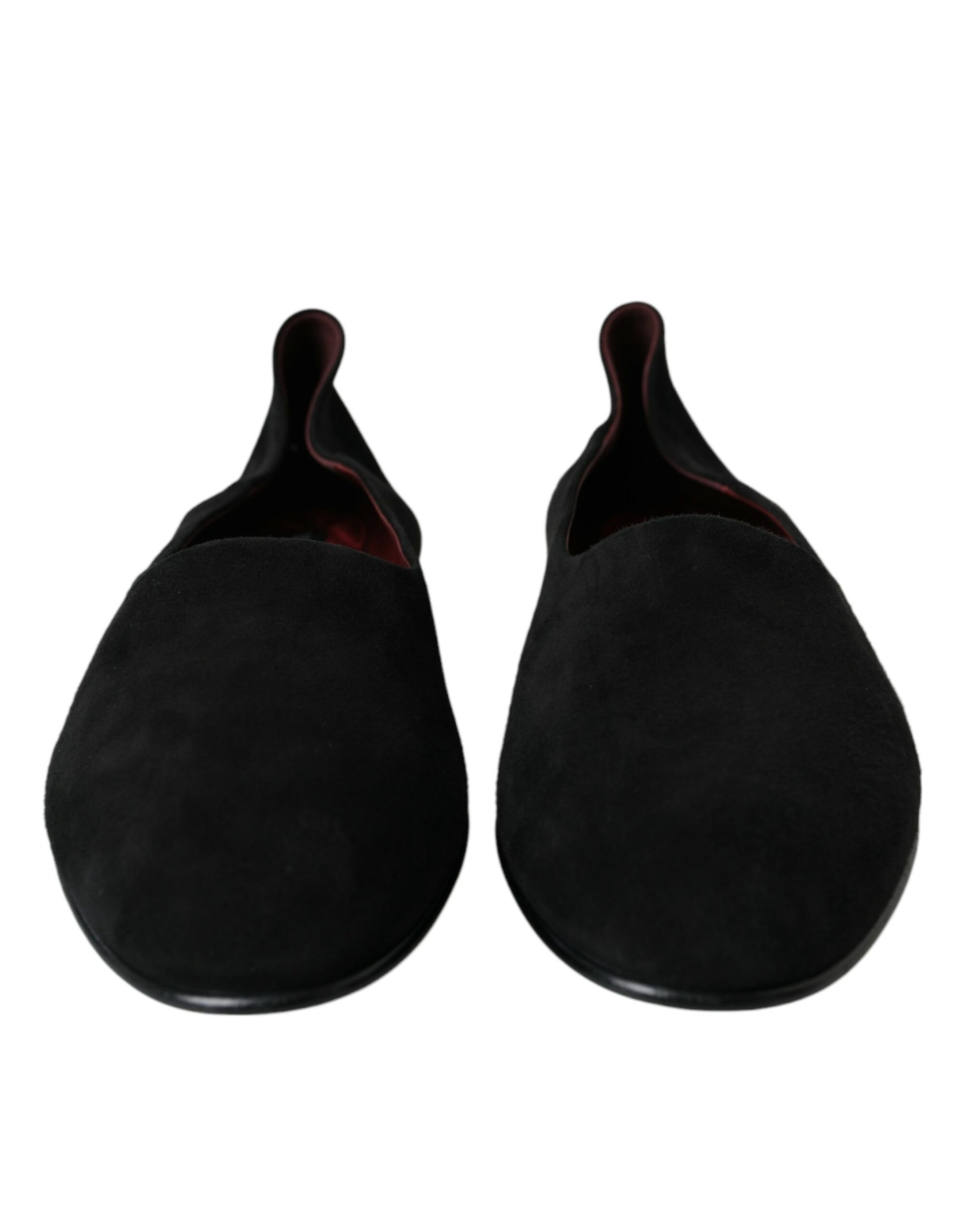 Pair of black velvet slippers with red soles