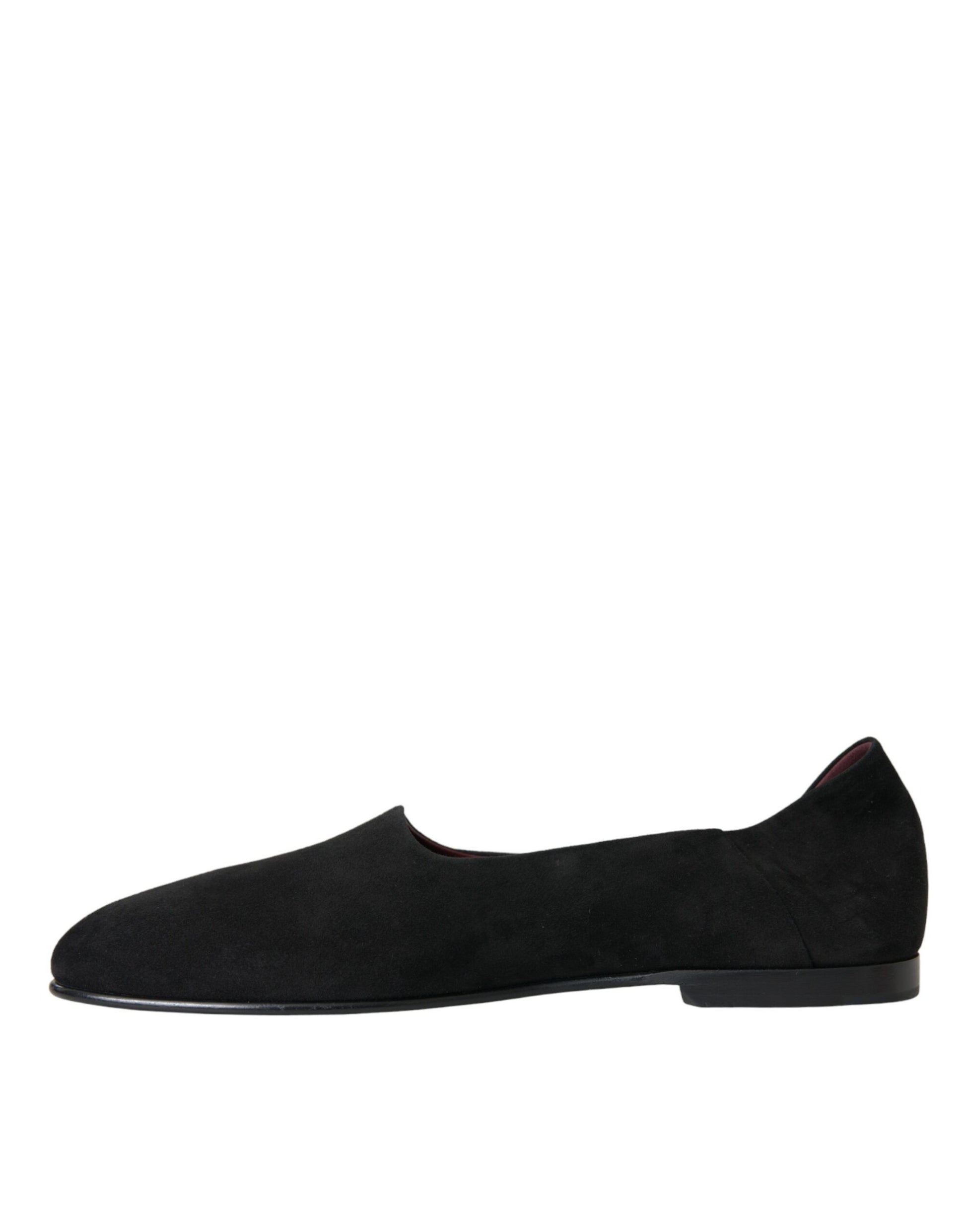 Pair of black dress shoes with laces and a small heel