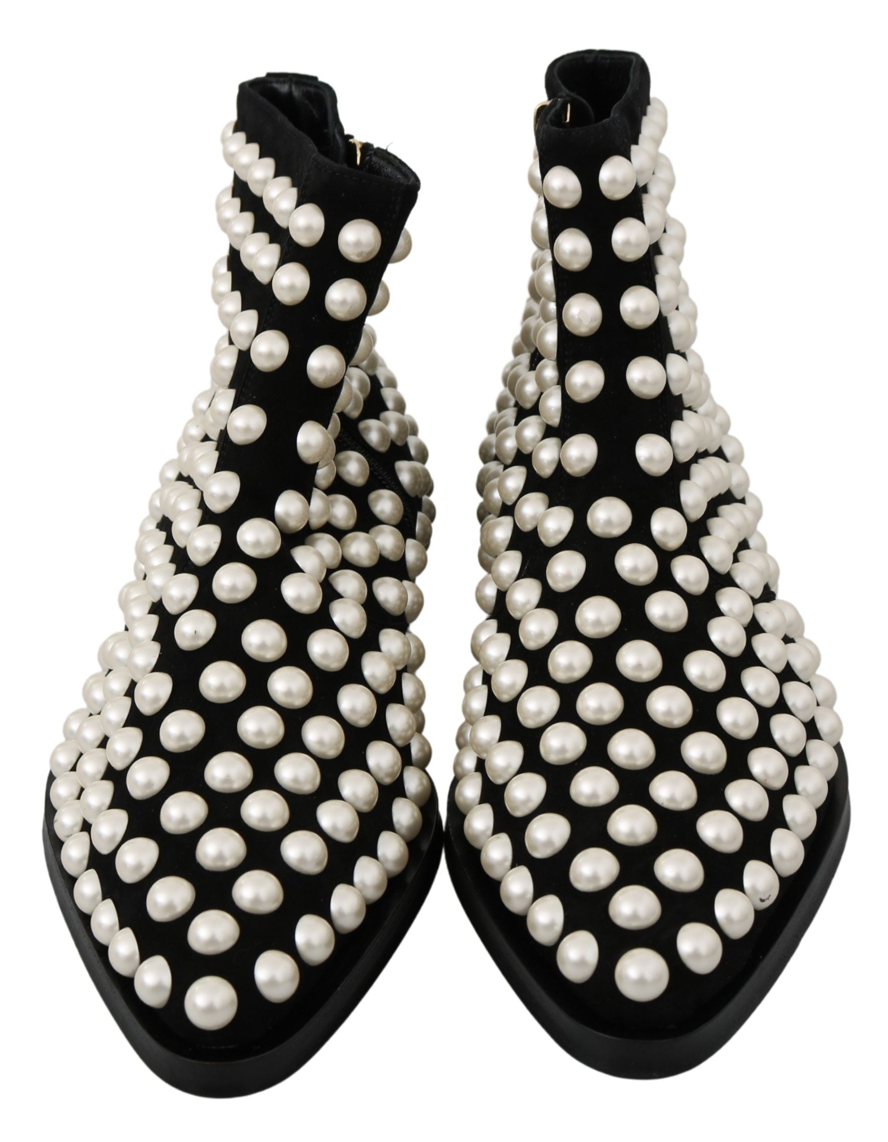 Pair of black boots with pearl embellishments