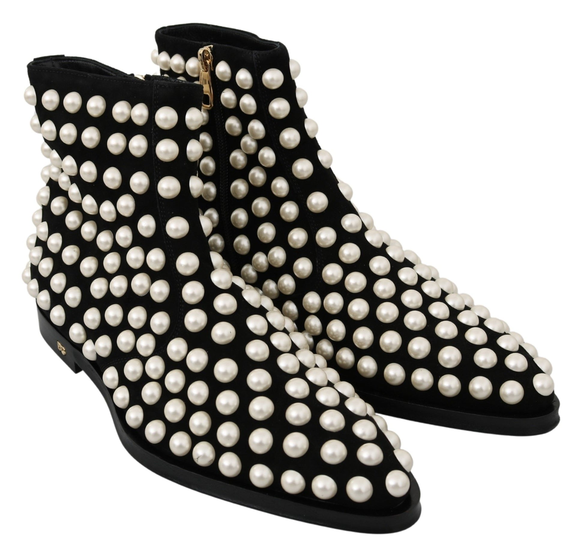 Black suede boots with pearl embellishments on the heels and toes
