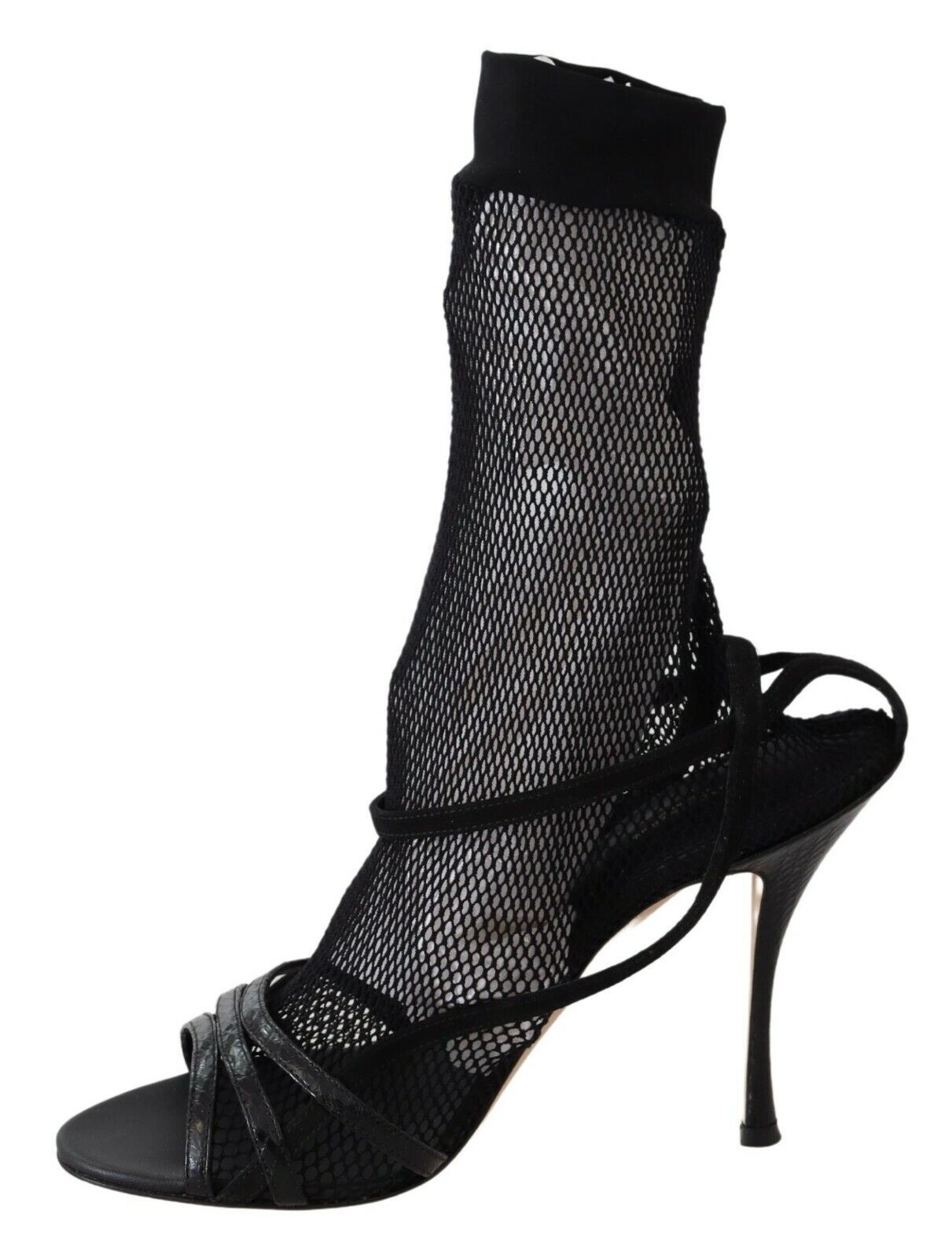 Black high heel shoe with mesh stocking and black straps