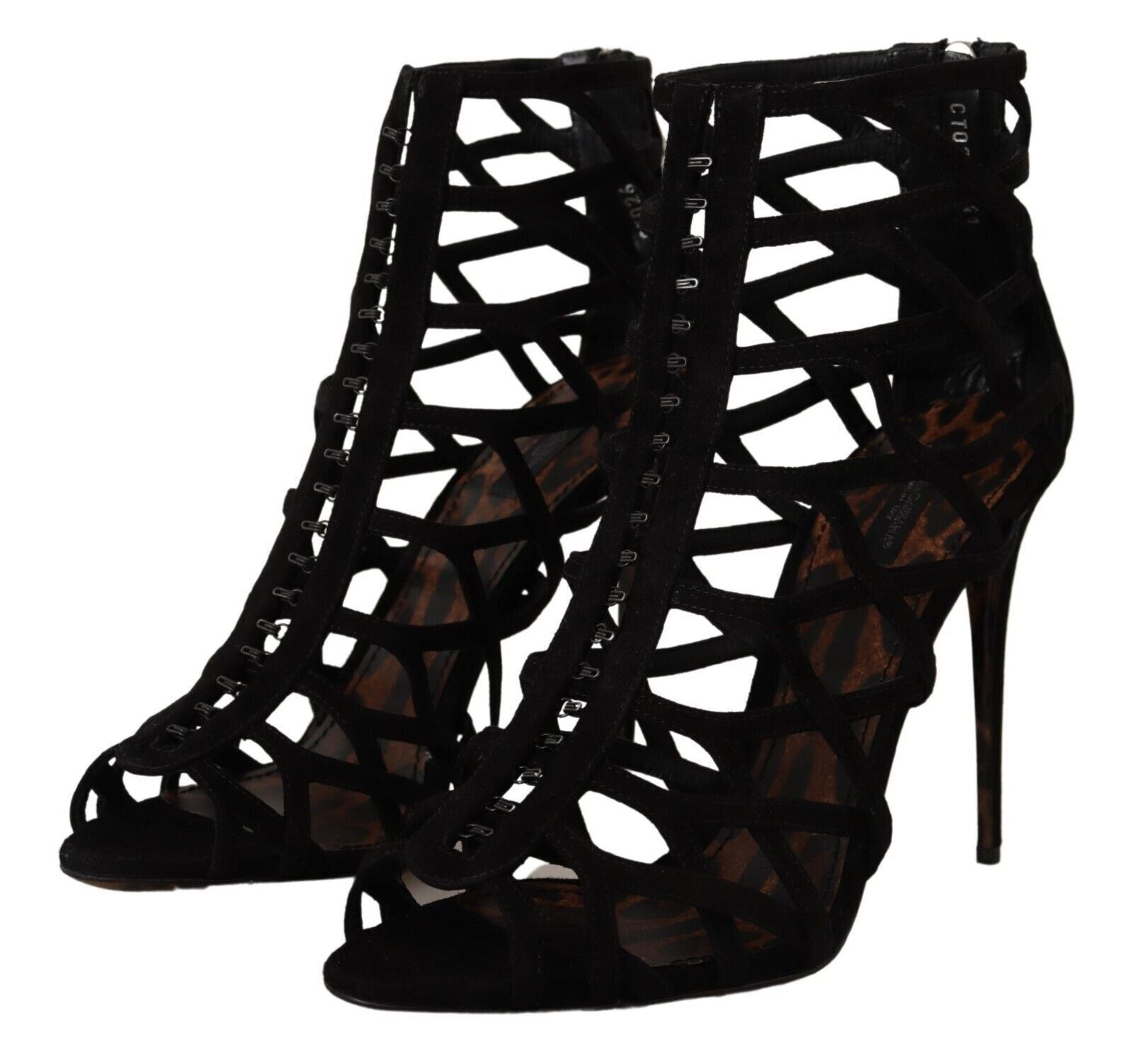 Pair of black high heel shoes with lace up detailing and a stiletto heel