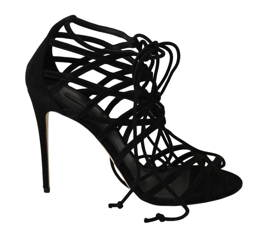 Black high heel shoe with straps and buckle details
