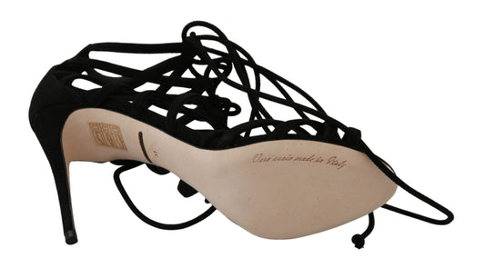 Black high heel shoe with straps and a bow on top