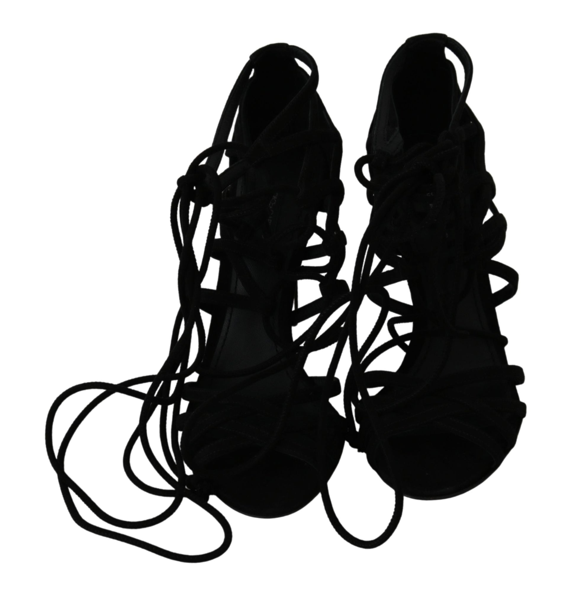 Pair of black high heel shoes with laces and straps