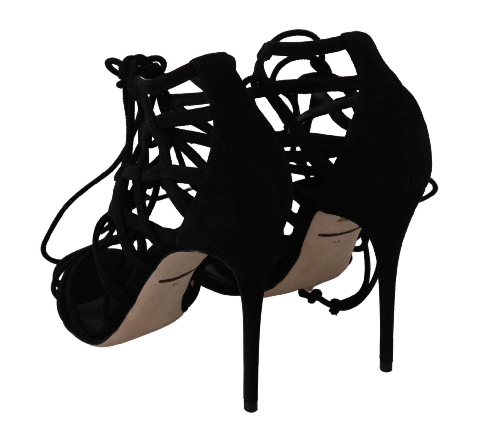 Pair of black high heel shoes with ankle straps and a strap over the foot