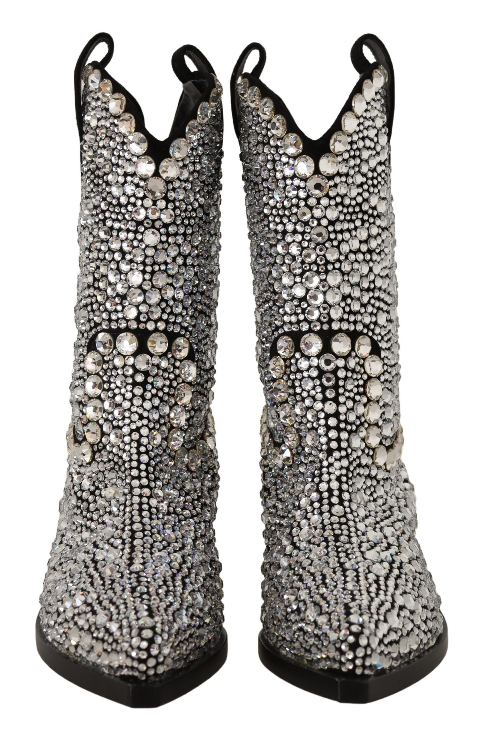 Pair of shiny silver cowboy boots with rhinestones