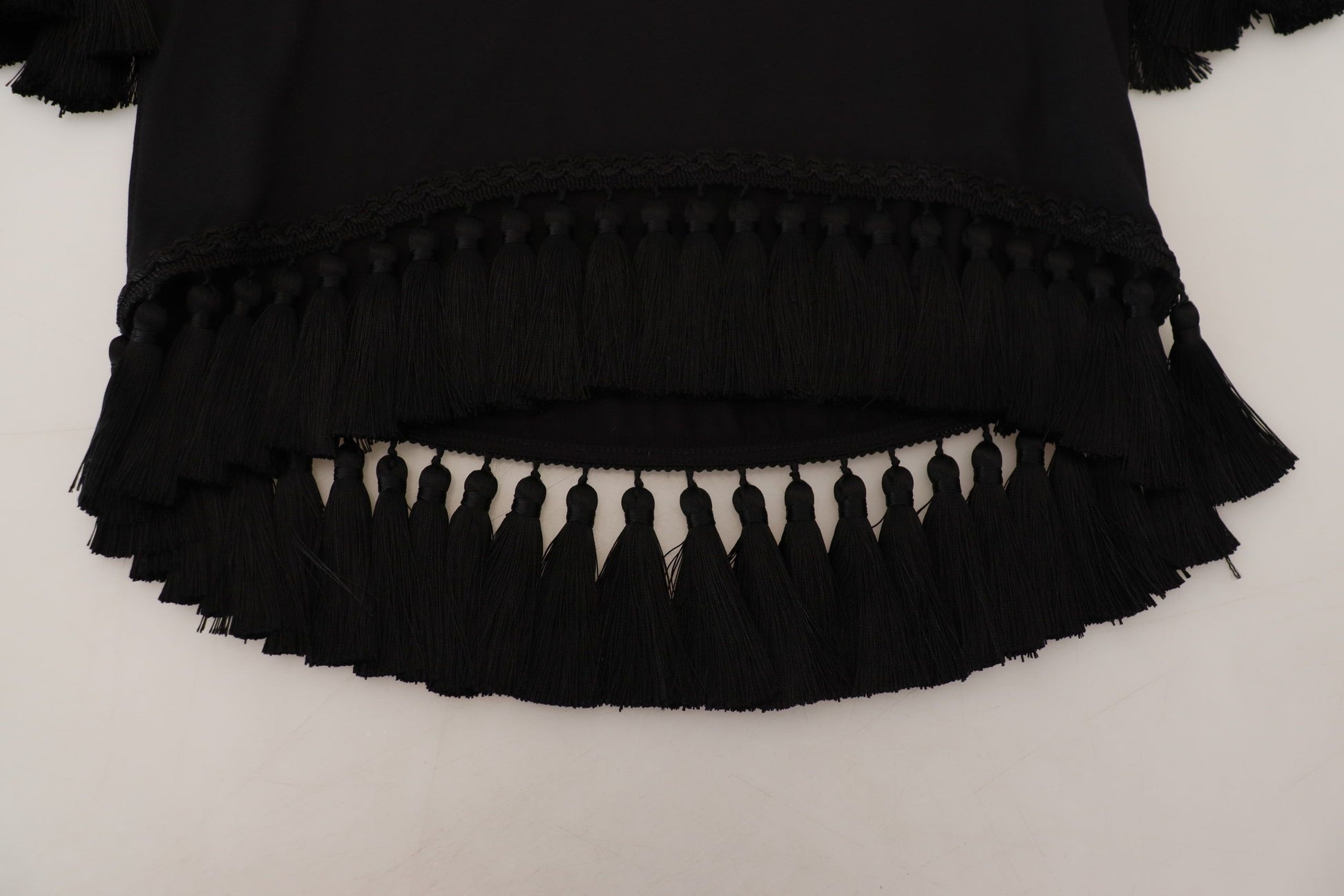 Black fringe shirt with white teeth embroidery on front