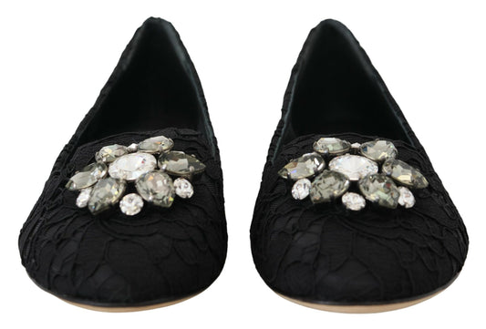 Pair of black shoes with embellished heels featuring multiple stones