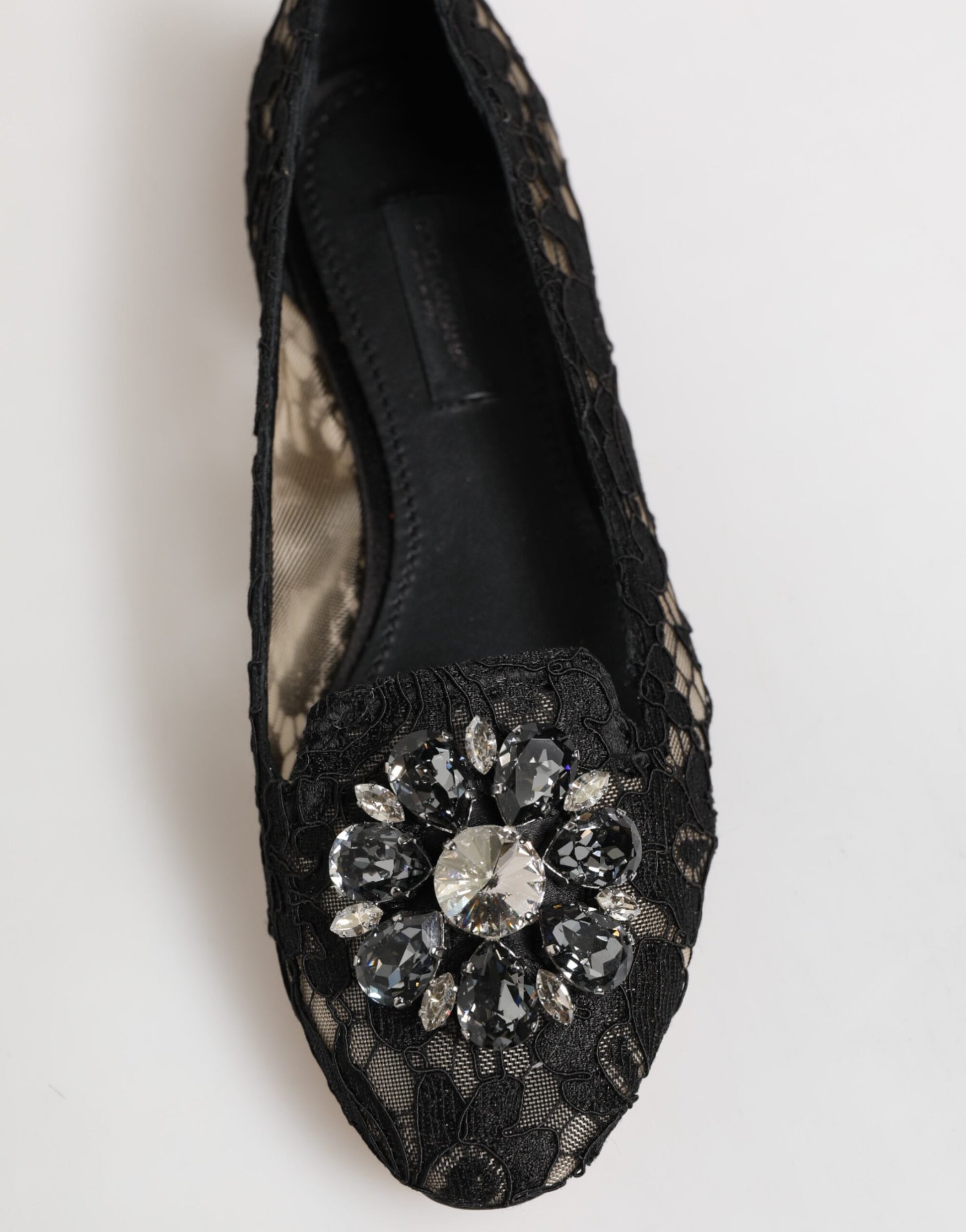 Black shoe with embellishments on toe