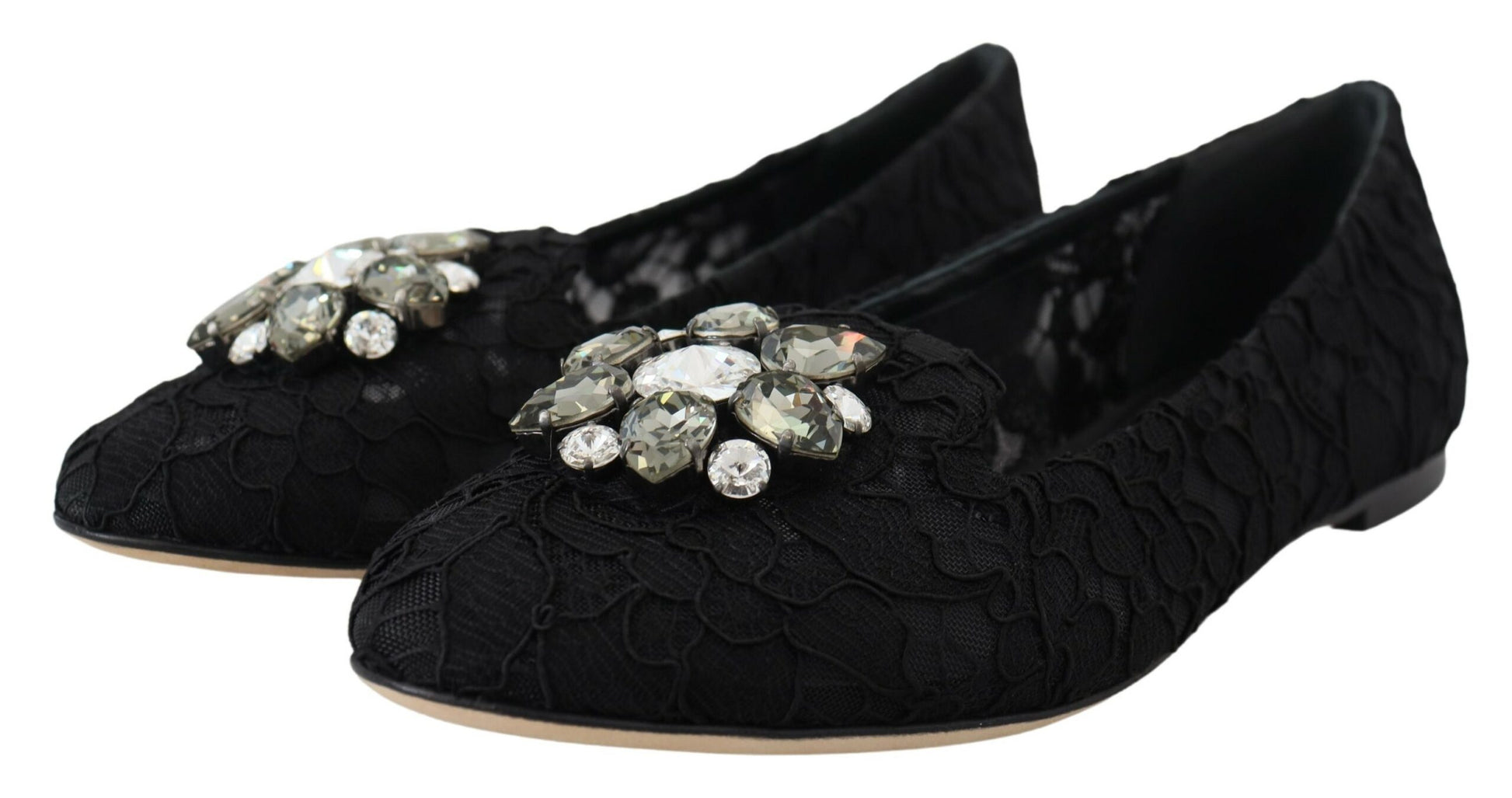 Pair of black shoes with embellishments on top