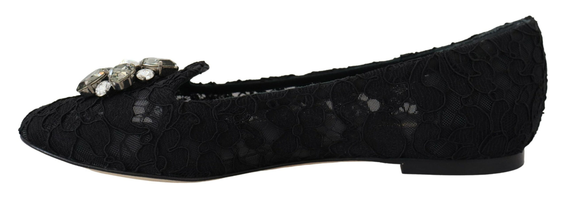 Pair of black glittery women's shoes with embellishments and a bow on top