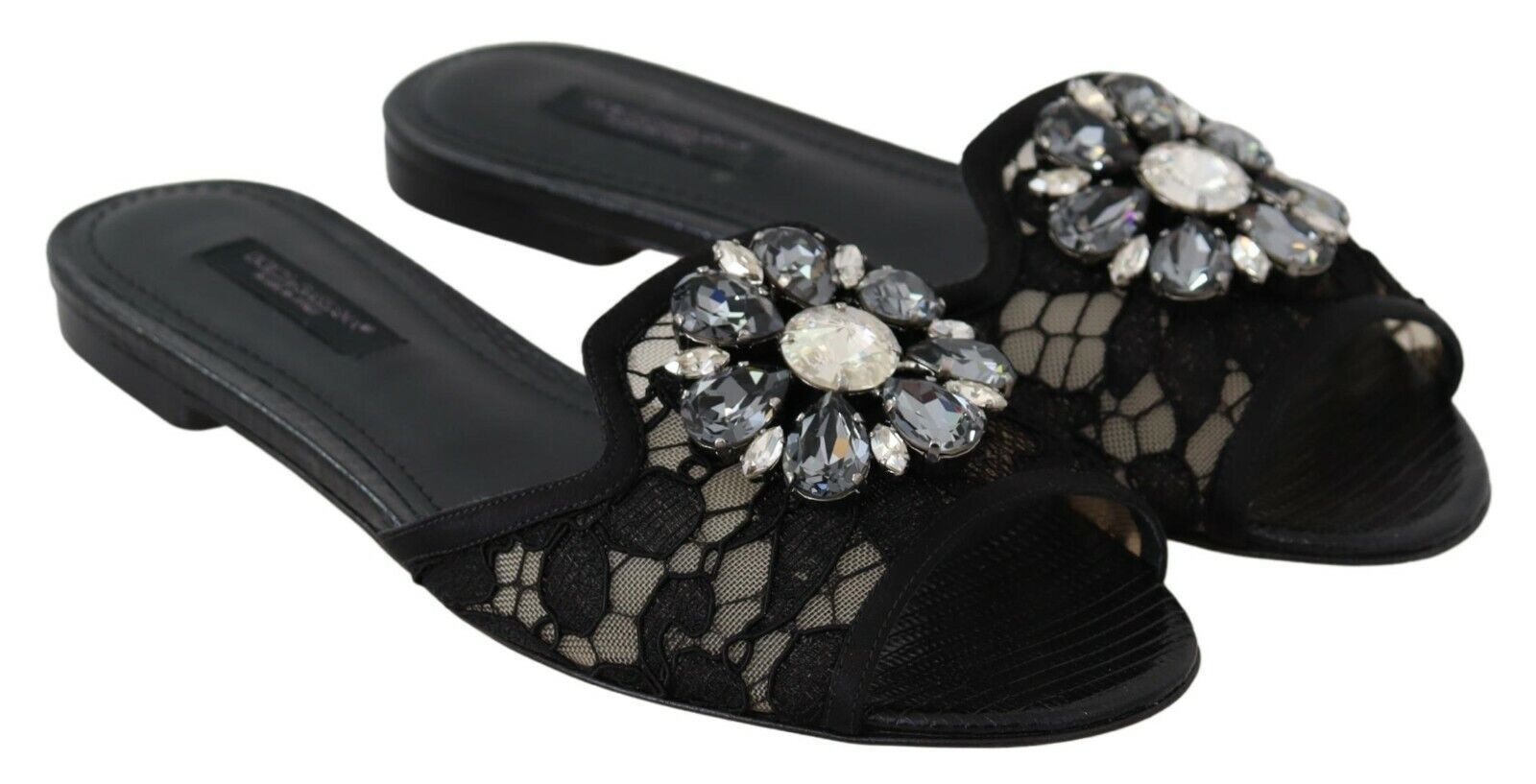 Pair of women's sandals with embellishments and a patterned design
