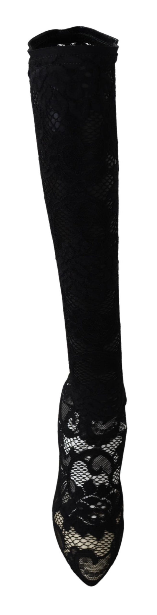 Pair of black knee high boots with lace up front and embellishments on sides