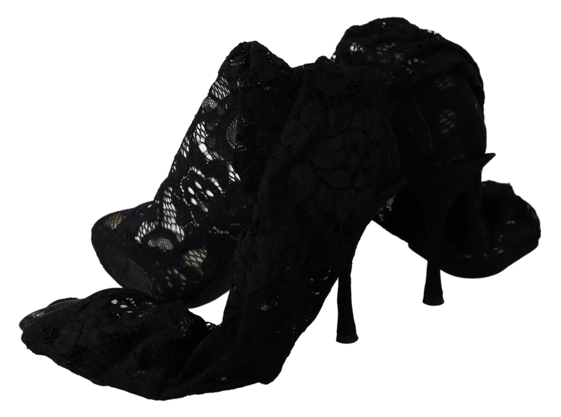 Black shoe with intricate design and laces