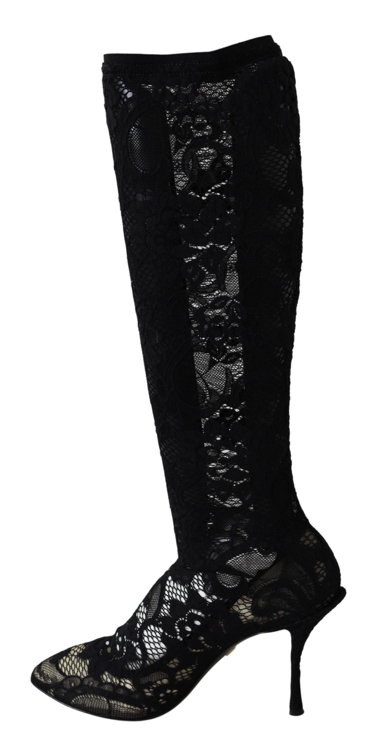 Black knee high boots with lace up detail and patterned design on side