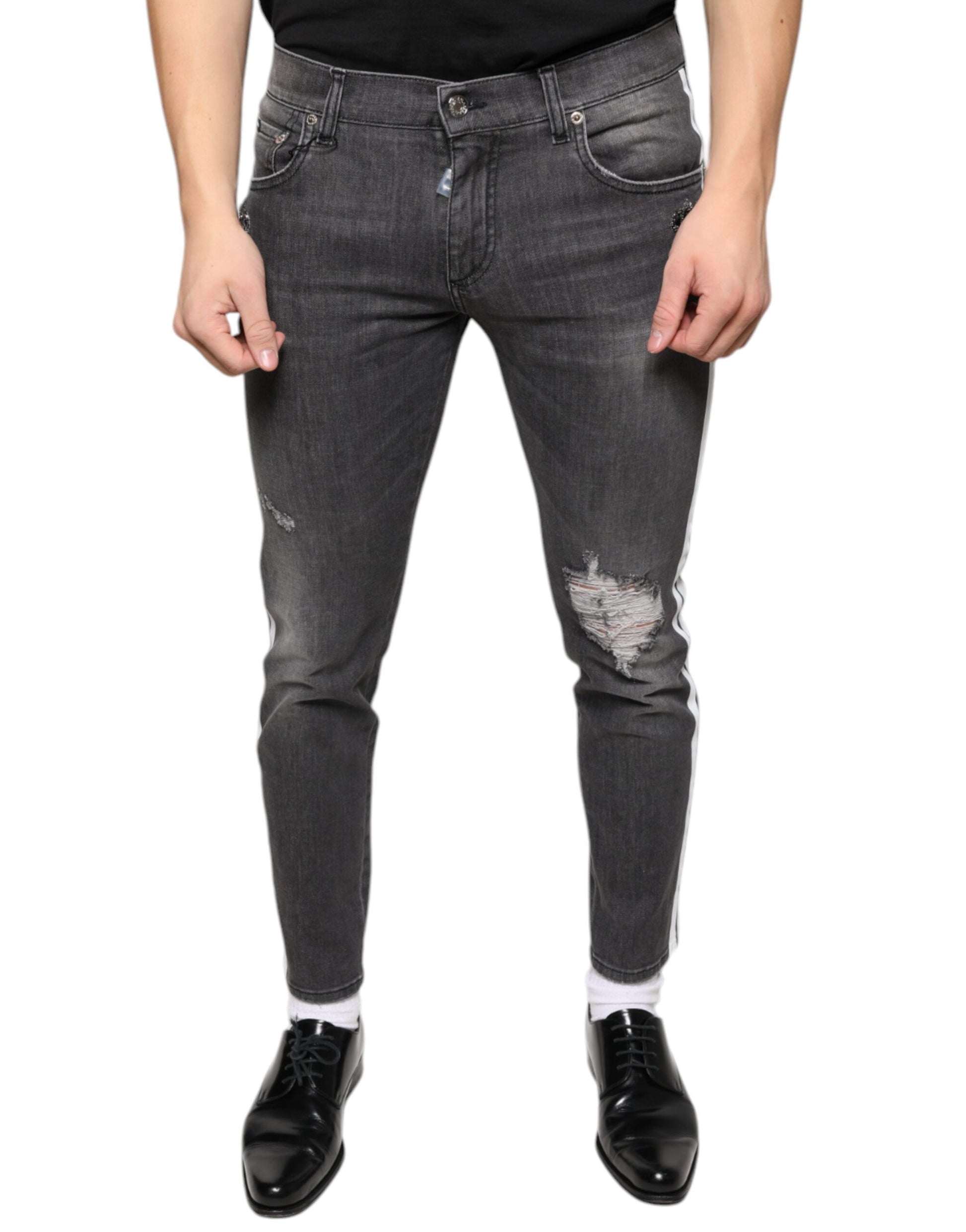 Pair of blue denim jeans with distressed details