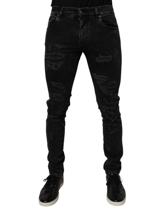 Black skinny jeans with distressed design on legs