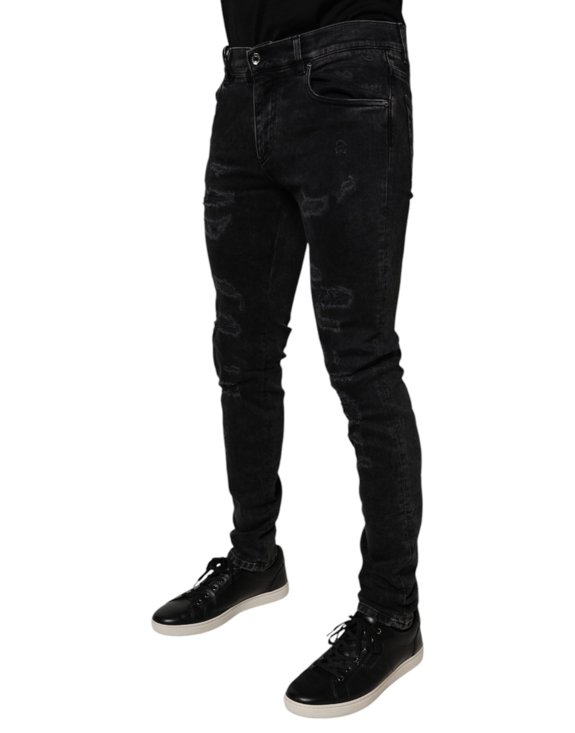 Man wearing black jeans and shoes